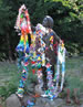 Sadako's statue in Seattle, with my white crane at the bottom, folded out of a flyer. 'I tell the children folding paper cranes will not stop atomic war, but folding cranes will make friends and friends will not make war.' - Floyd Schmoe, Seattle pacificist who helped rebuild Hiroshima.